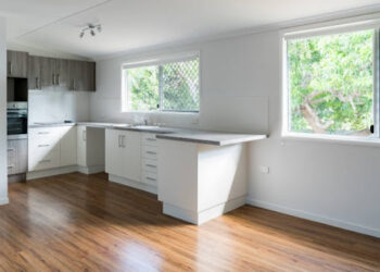 New kitchen in renovated house with timber floating floor