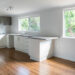 New kitchen in renovated house with timber floating floor